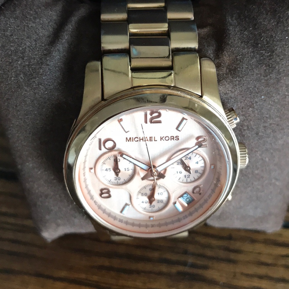 Michael Kors rose gold watch.